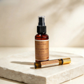 Ritual Energía Vital de Mayam Holistic con bruma y roll-on de aceites esenciales cítricos sobre base de piedra